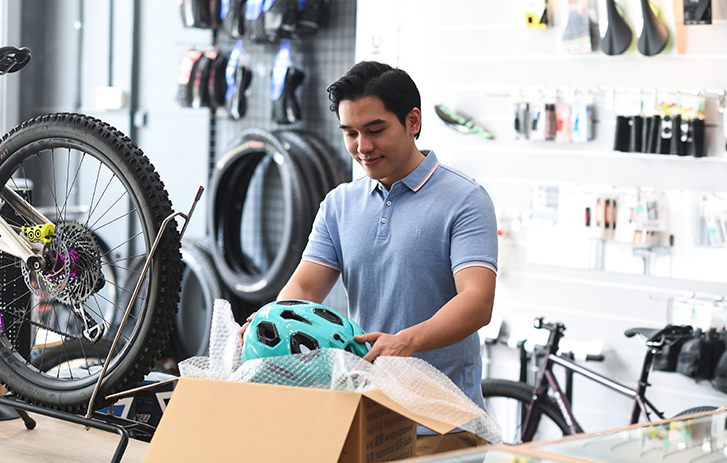 Man packing FedEx box