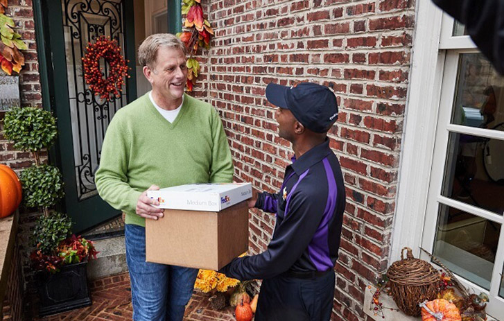 fedex courier with package