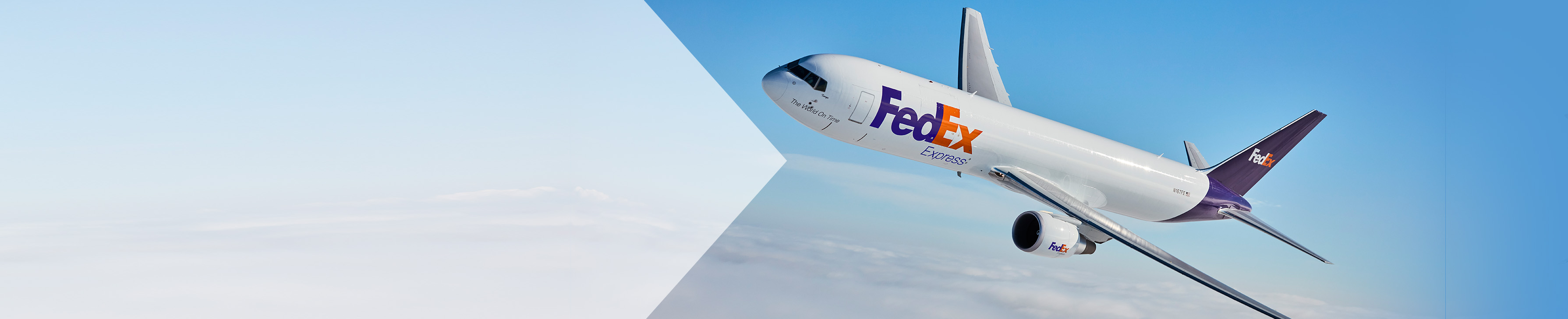 FedEx Plane flying above the clouds