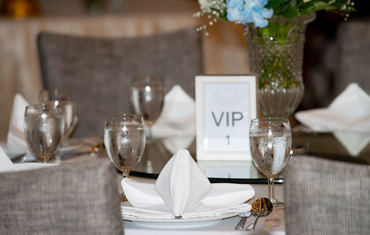 Table settings with VIP card in center