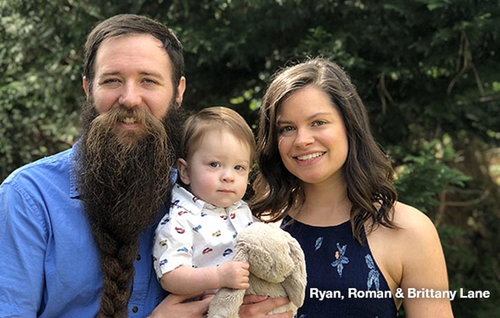 A photo of Ryan and Brittany Lane, owners of Dream Beard, with their son, Roman.