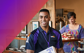 FedEx courier in front of a woman who just received a delivery.