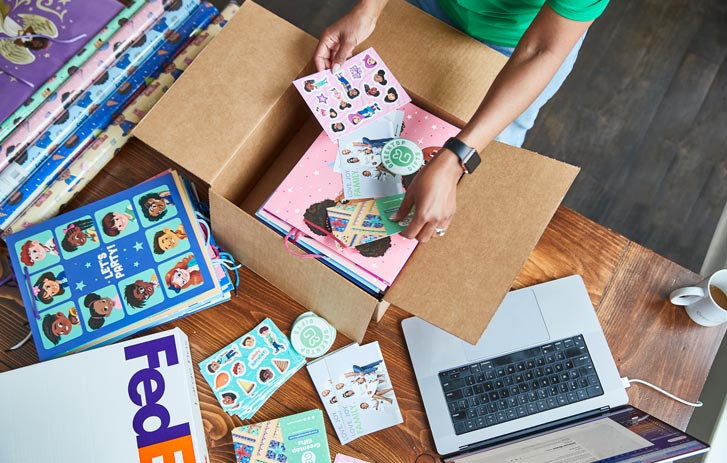 Business owner packing a box