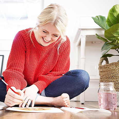 A lady sitting printing