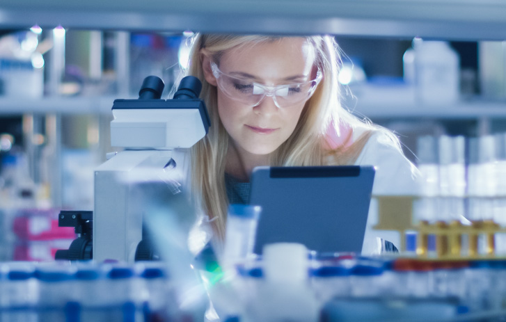 woman at microscope