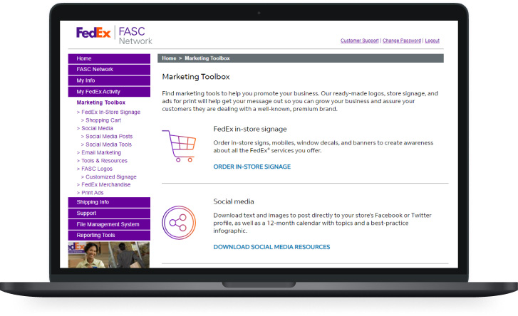 Laptop open with screen showing the FASC Marketing Tools